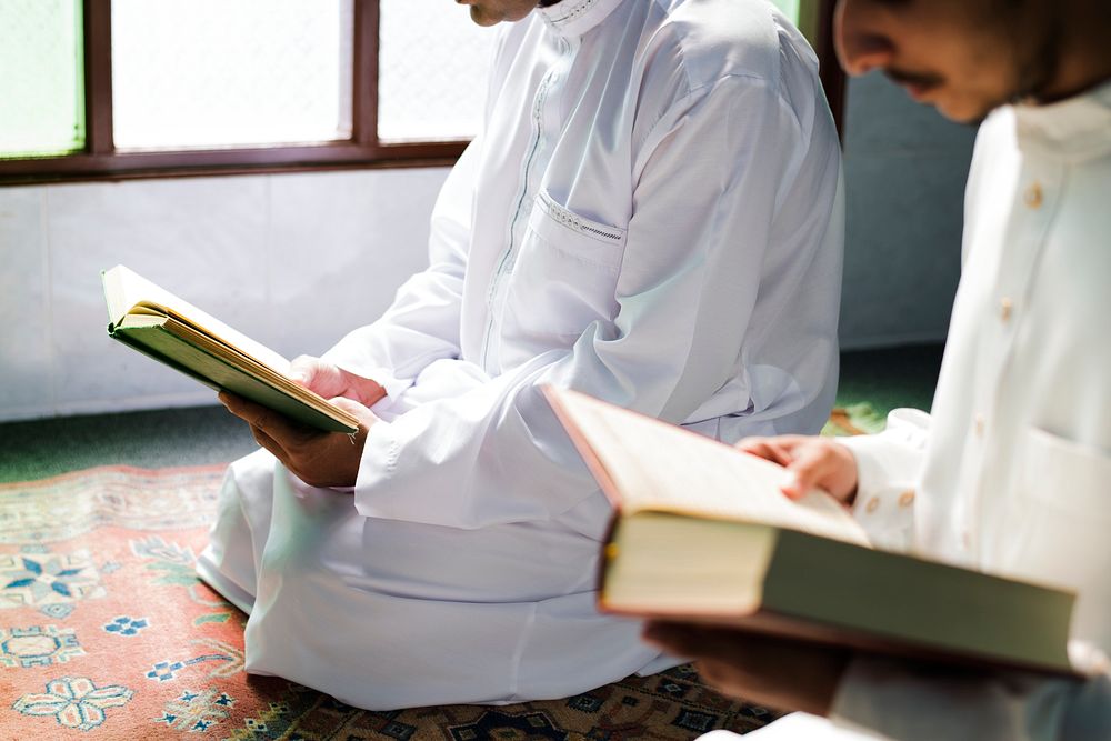 Muslims reading from the quran