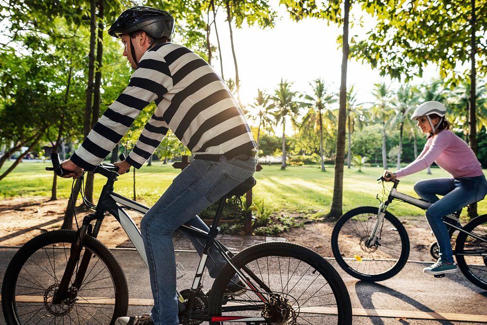 Family on a bike ride in the park