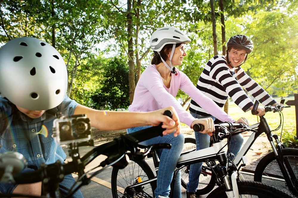Family on a bike ride in the park