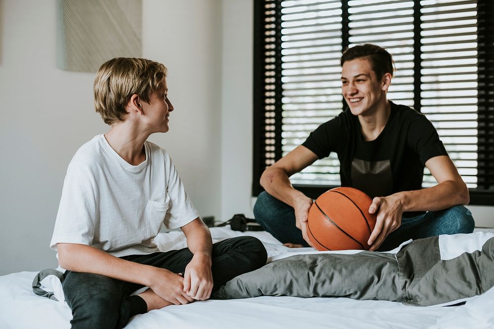 Siblings bonding over a basketball conversation