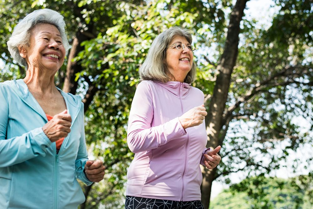Senior friends exercising outdoors