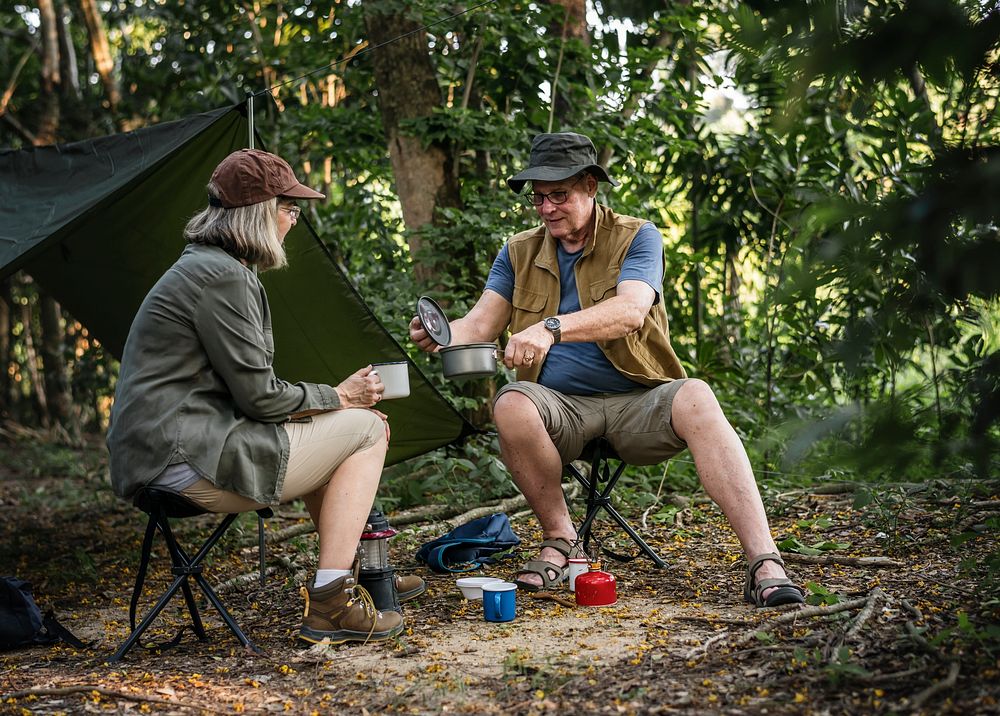 Friends having coffee at a campsite