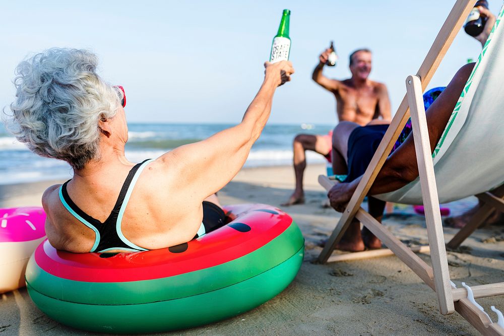 Friends having a drink at the beach