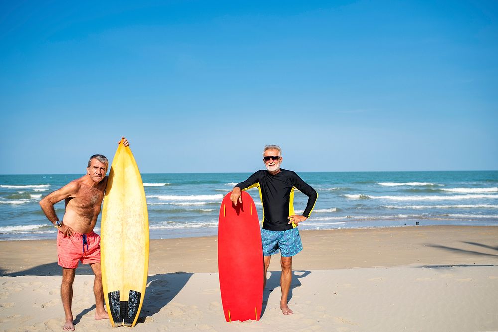 Mature surfers at the beach