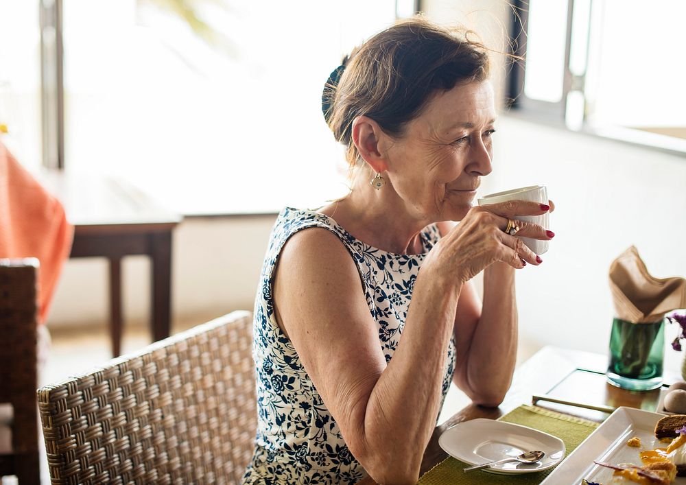 Senior woman drinking a cup of coffee