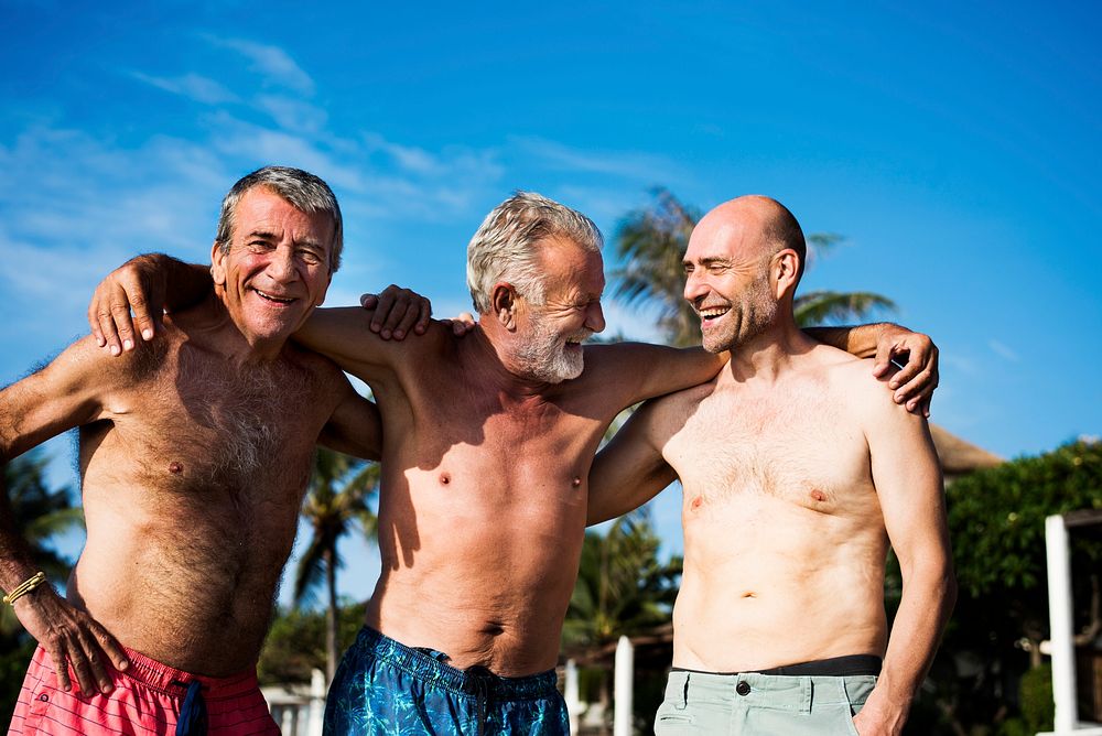 Group of senior men on the beach