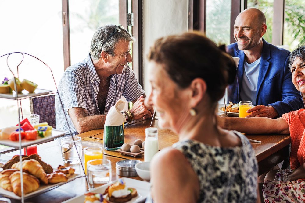 Friends having breakfast at a hotel