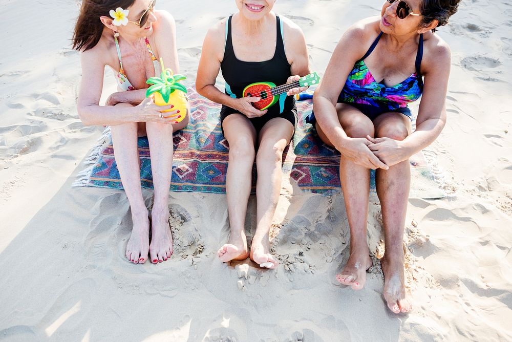 Senior women friends on the beach