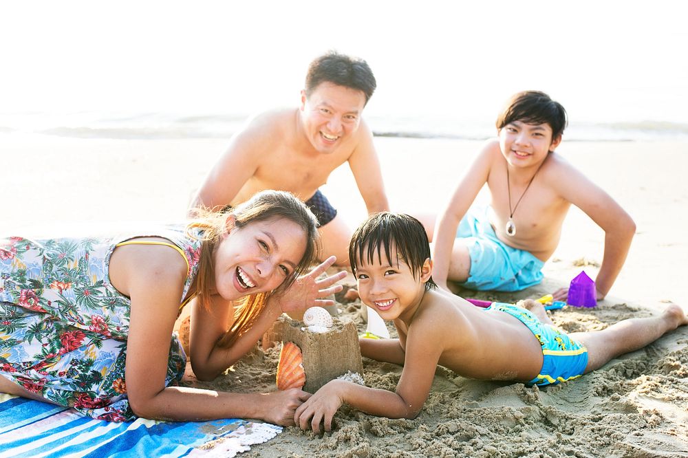 Asian family at the beach