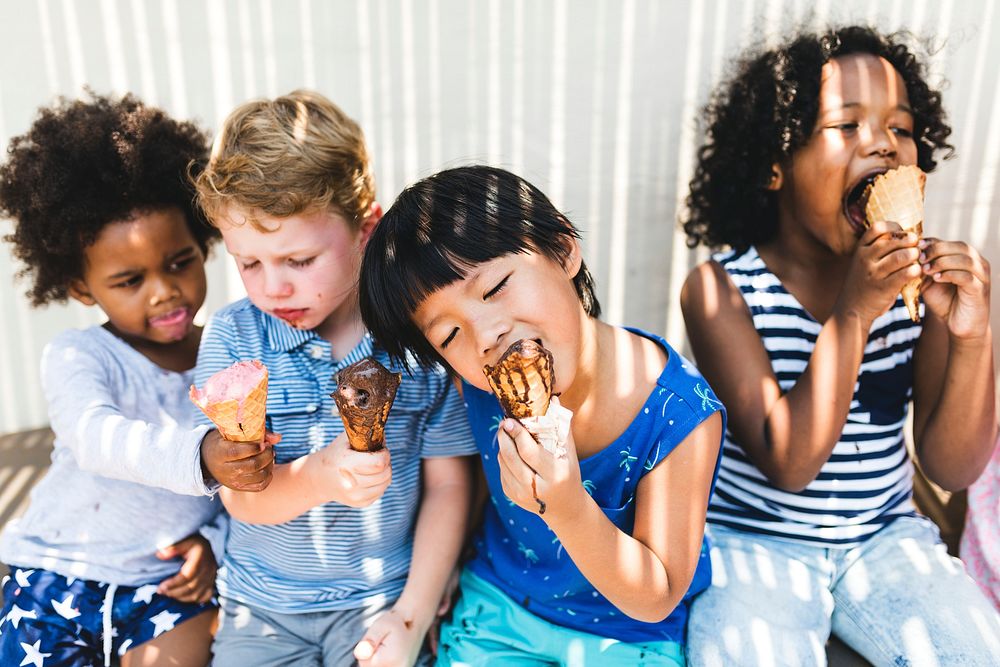 Little kids eating yummy ice cream