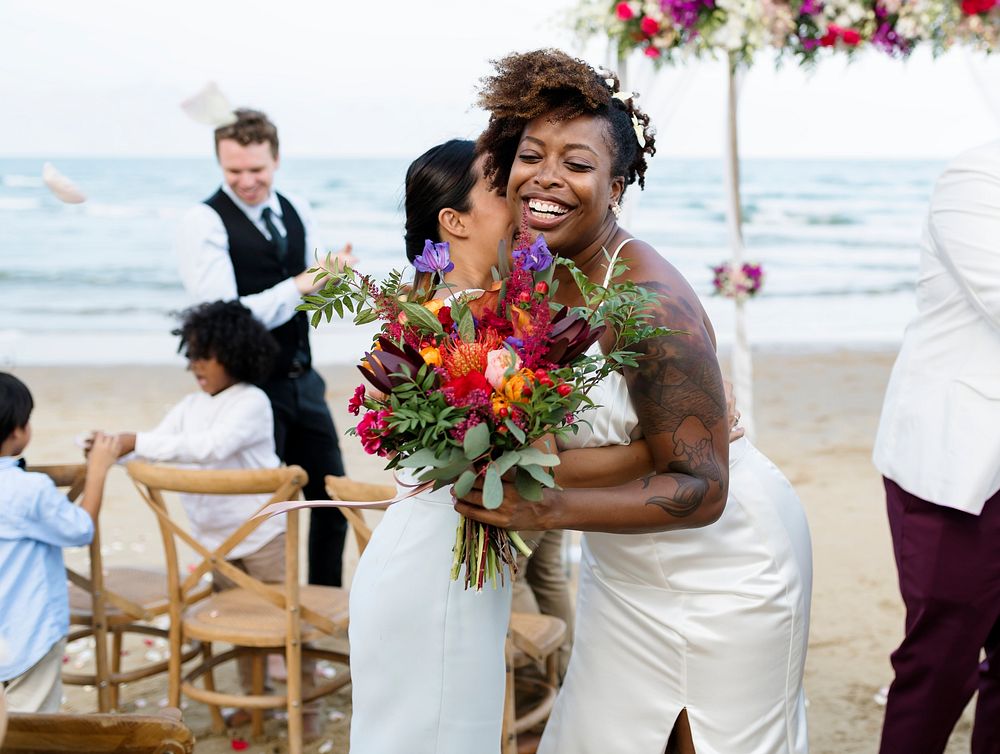 Cheerful bridge at her beach wedding