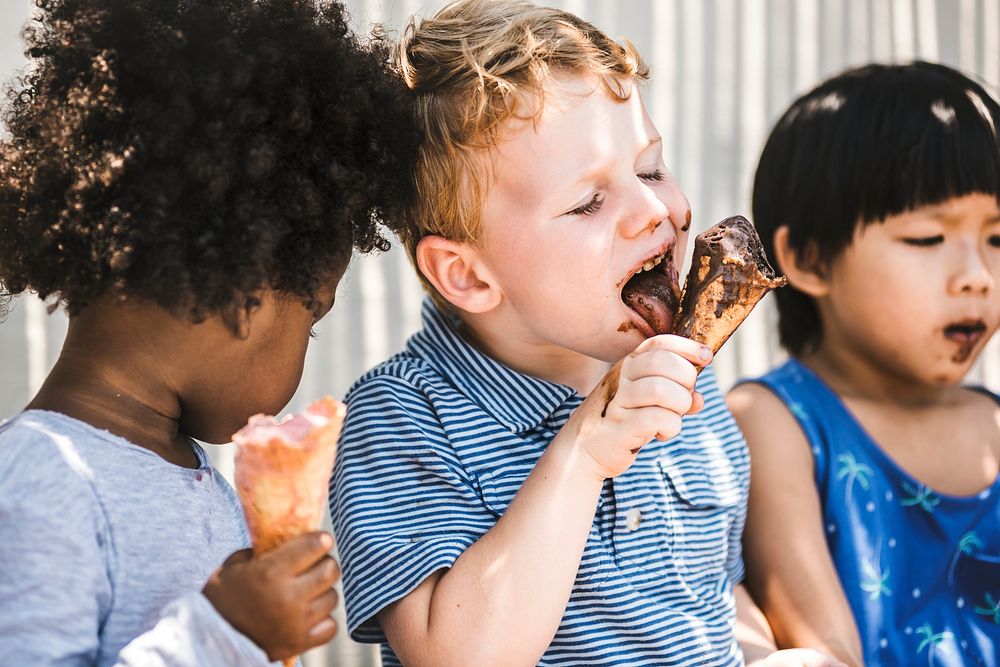 Children enjoying ice cream on a summer day