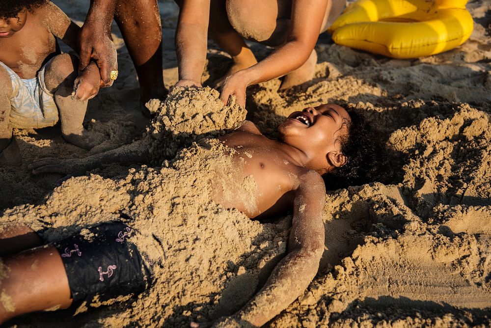 African family enjoying the beach