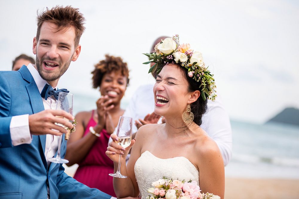 Happy newlyweds at beach wedding