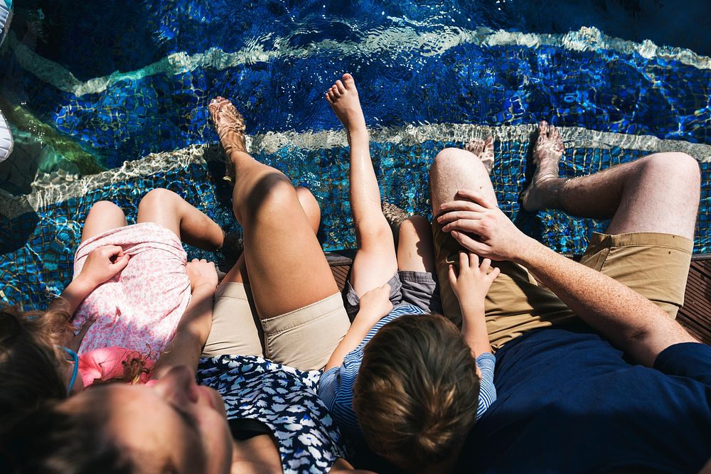 Family enjoying a swimming pool