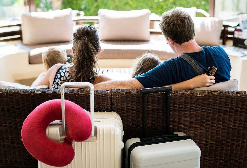 Family checking in to a resort