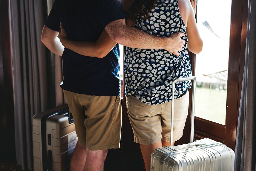 A couple with luggage