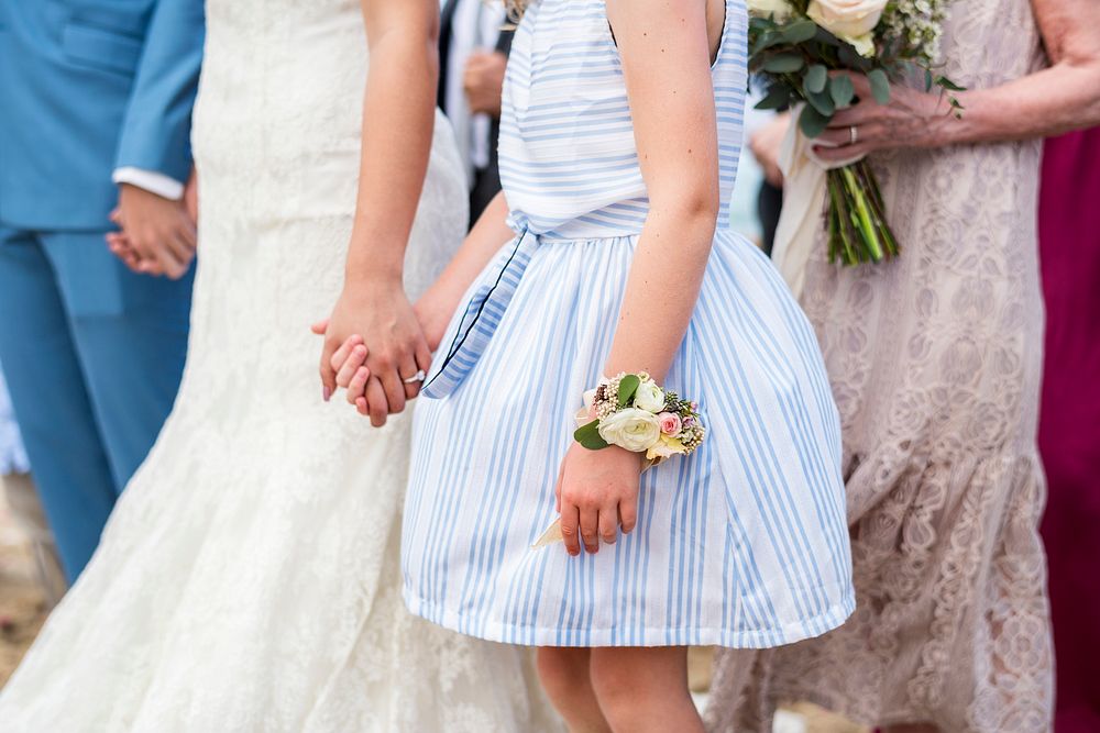 Little bridesmaid at a beach wedding