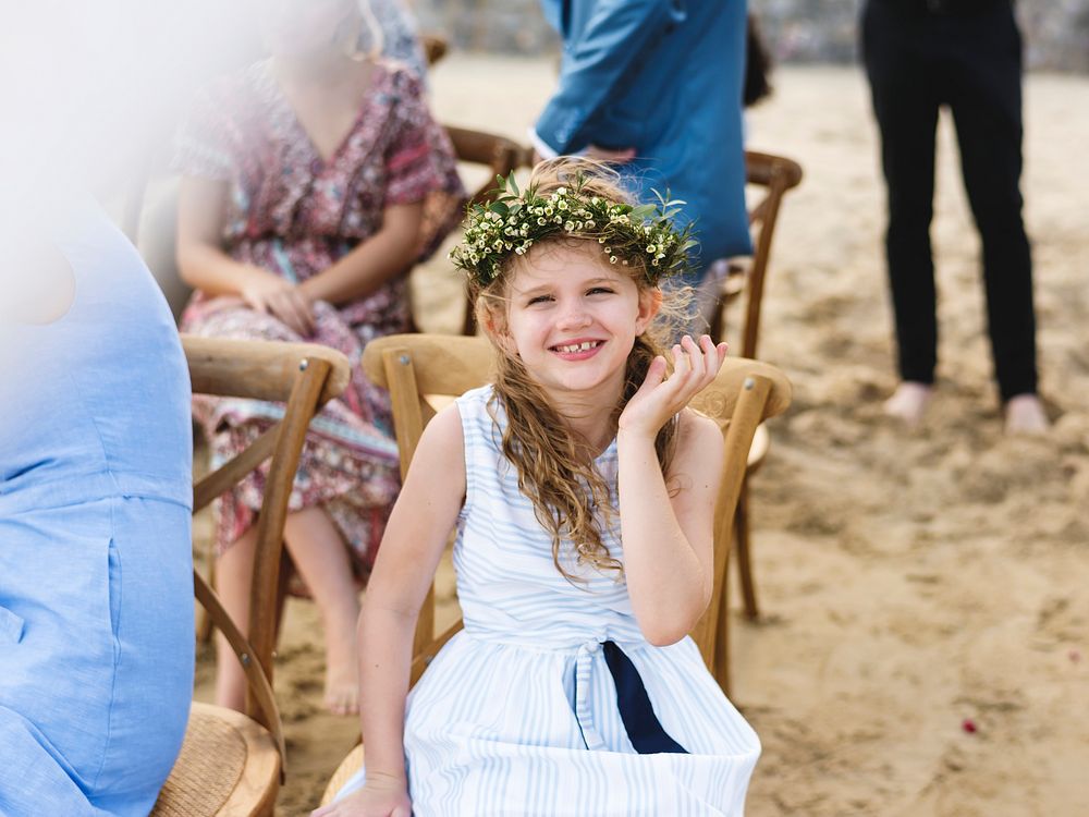Little bridesmaid at a beach wedding
