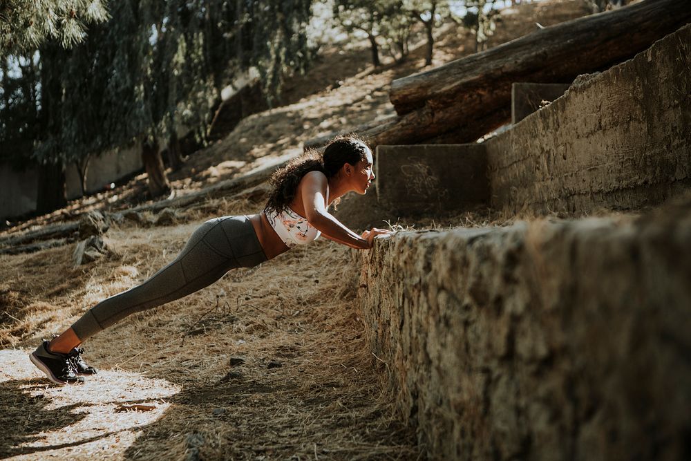 Woman stretching wile on a hike