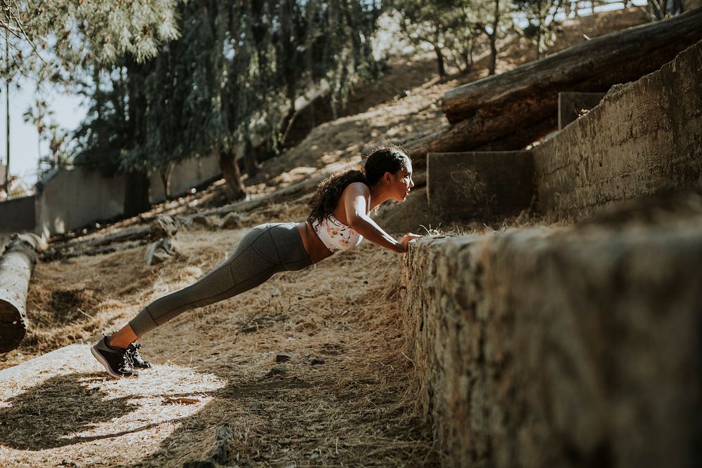 Woman stretching wile on a hike