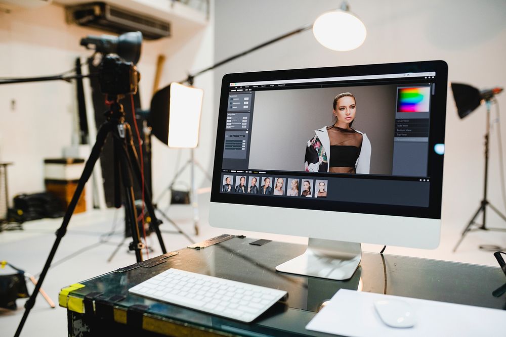 Female model on a computer screen in a studio