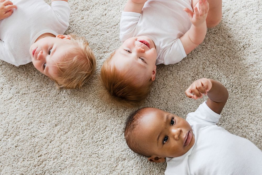 Babies lying on the floor