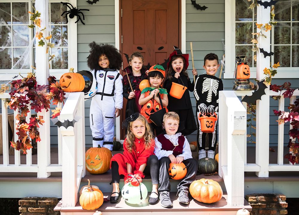Little children in Halloween costumes