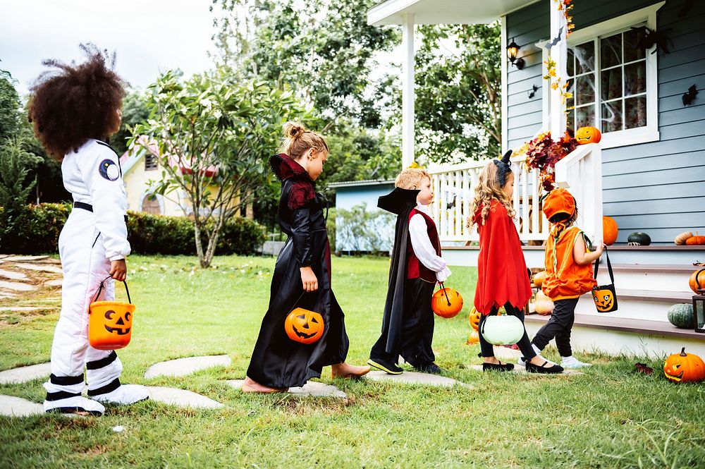 Little children trick or treating | Free Photo - rawpixel
