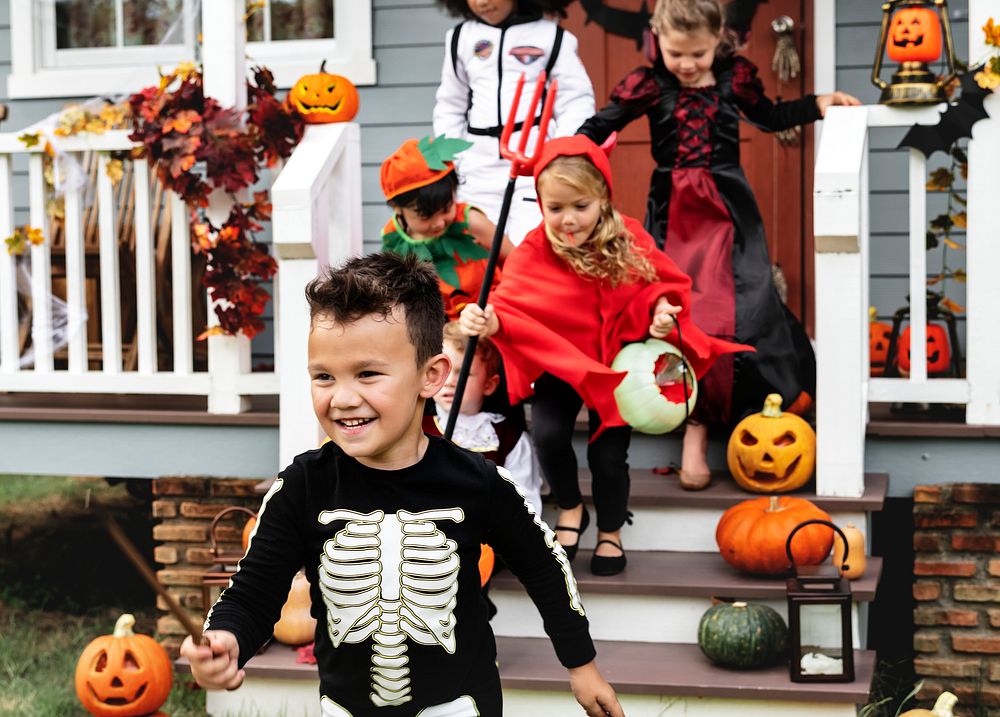 Young kids trick or treating during Halloween