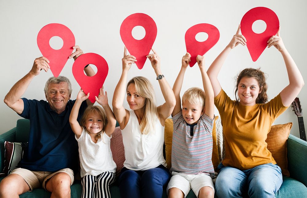 Family showing red check-in pins