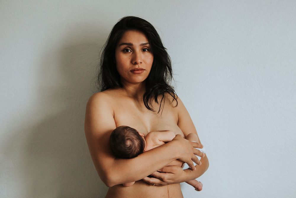 Mother holding her newborn baby