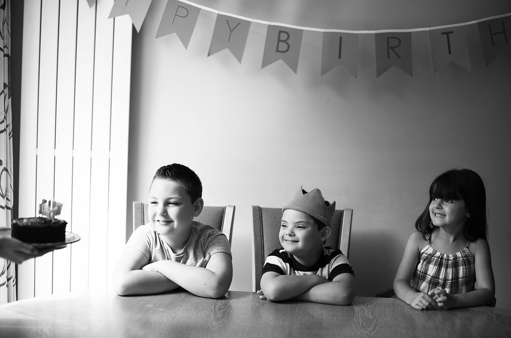 Family celebrating the birthday of their son