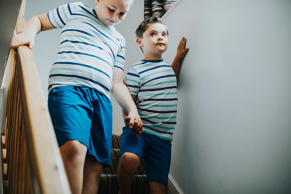 Brothers walking down the stairs