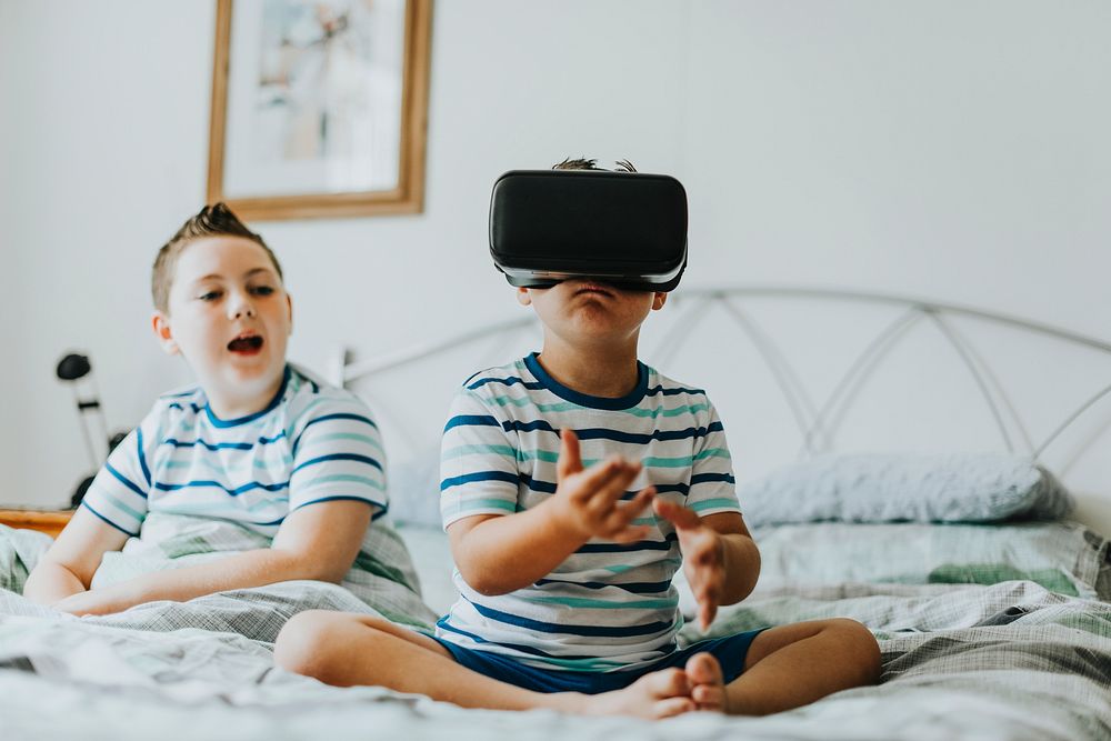 Boy playing with a VR headset