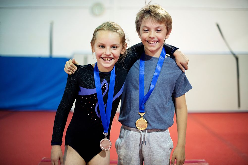 Young gymnasts with their medals