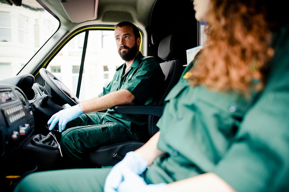 Paramedic man driving an ambulance