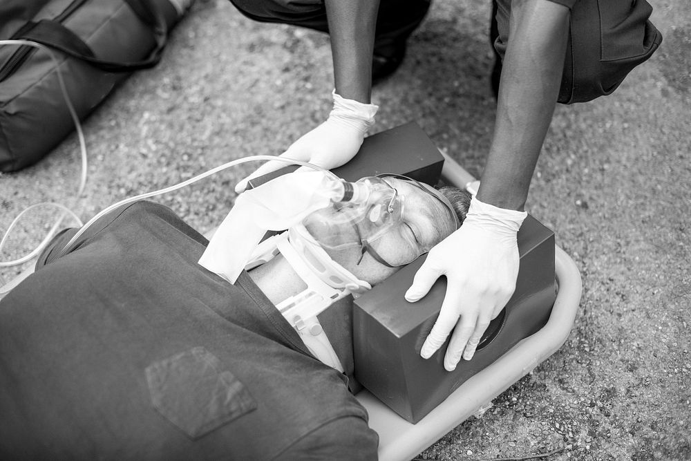 Paramedic team rescuing a critical patient
