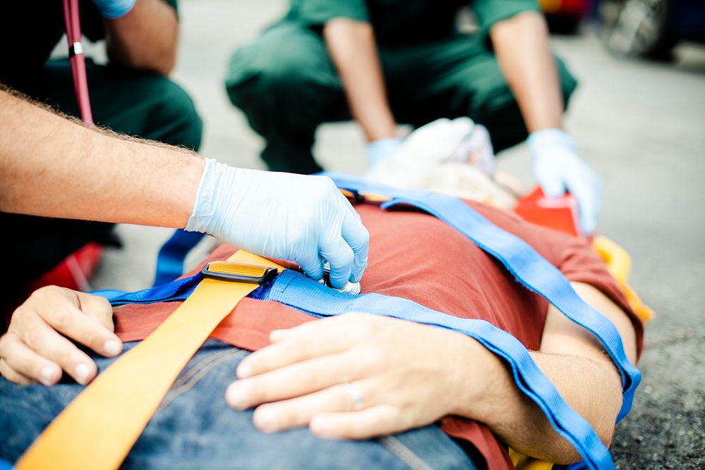 Paramedic team rescuing a critical patient