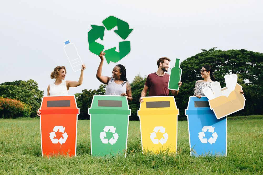 Diverse people with colorful recycle bins