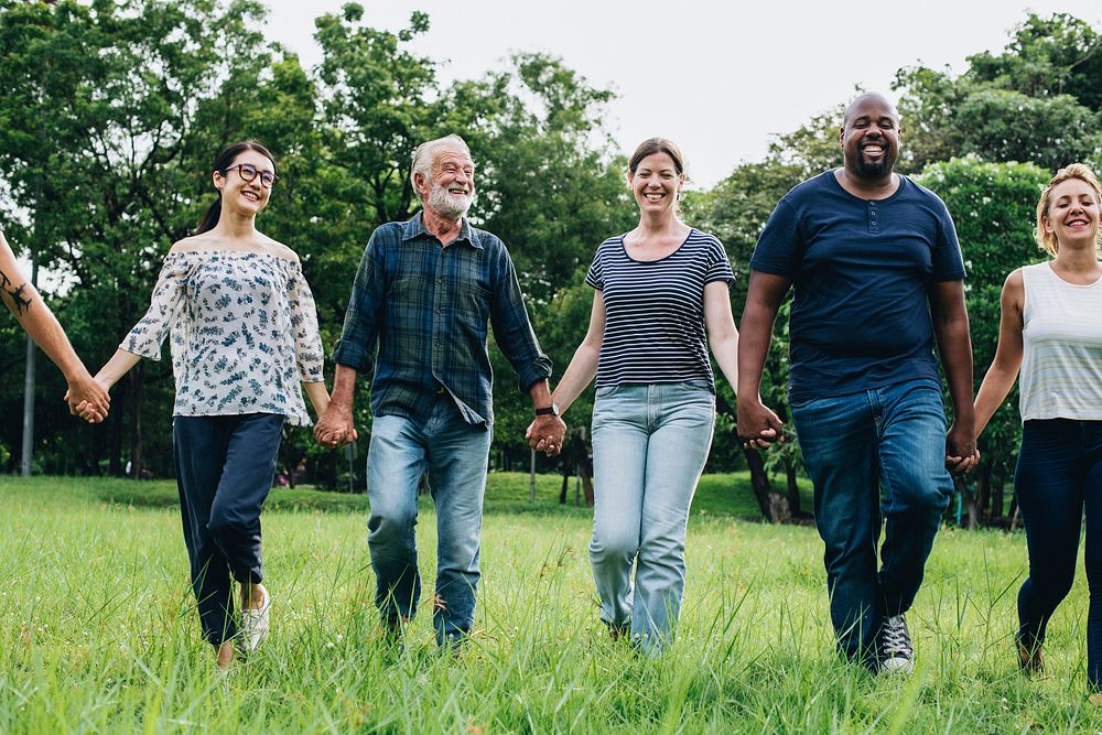 Happy diverse people enjoying in the park