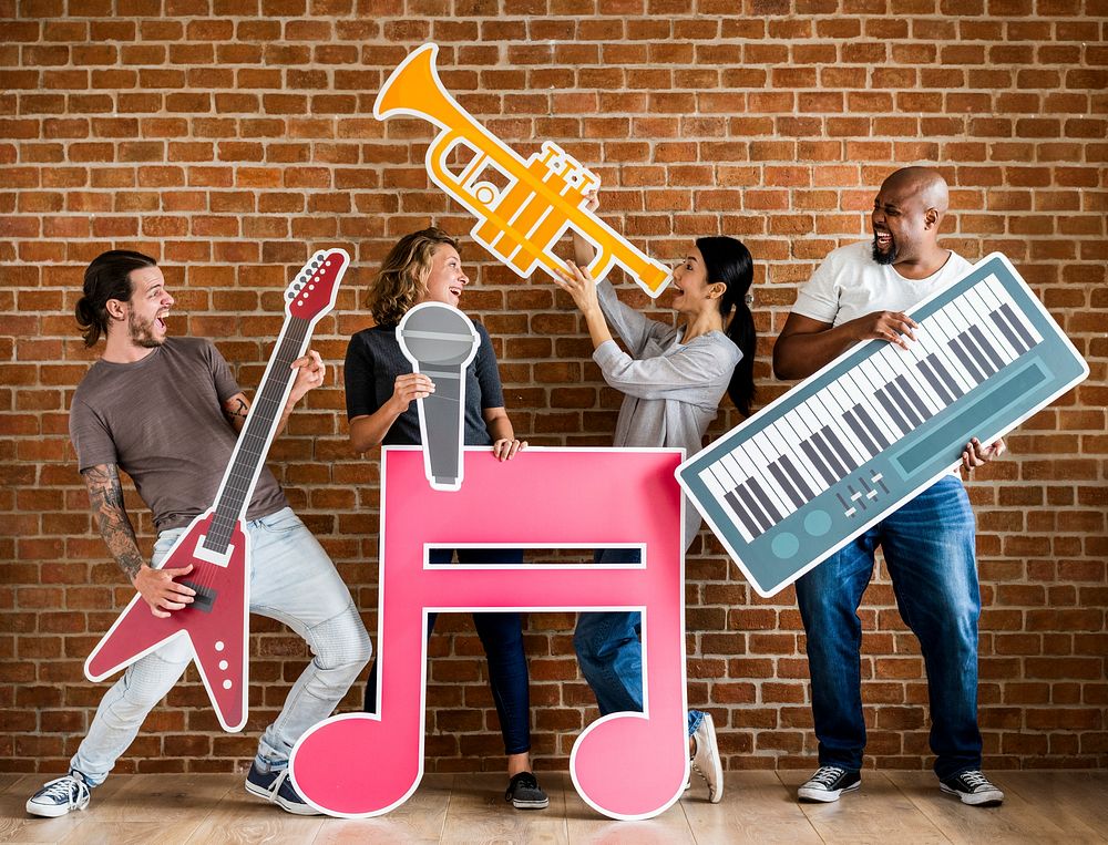 Diverse happy musicians playing together