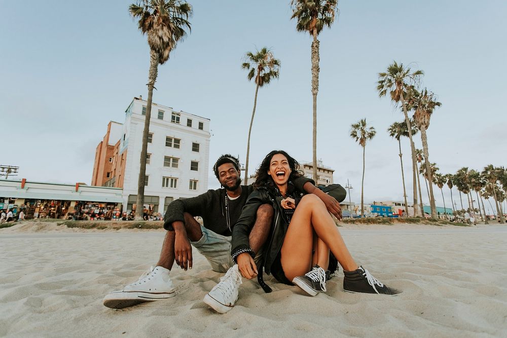 Couple relaxing at Venice Beach