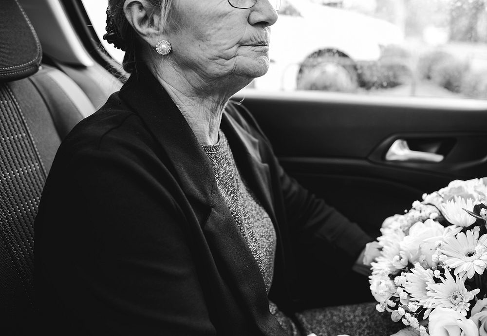 Sad widow on the way to th funeral