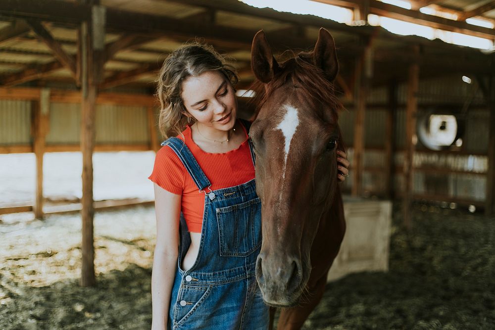 Portrait of a girl and a horse