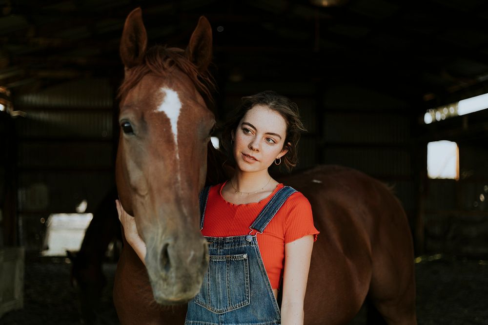Portrait of a girl and a horse