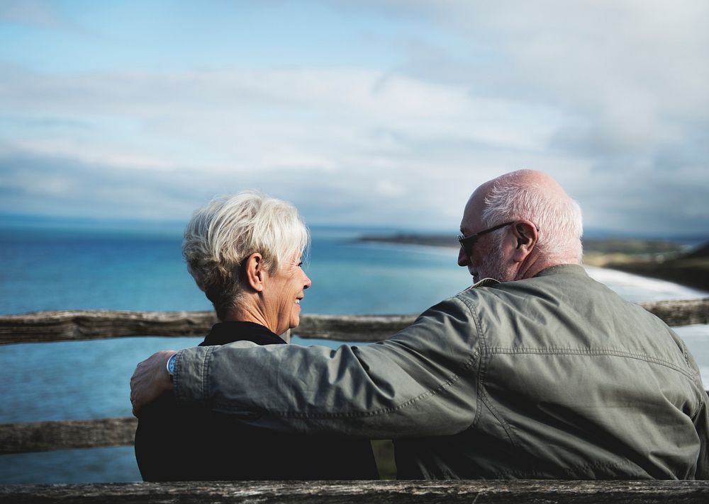 Senior couple enjoying the view of the ocean