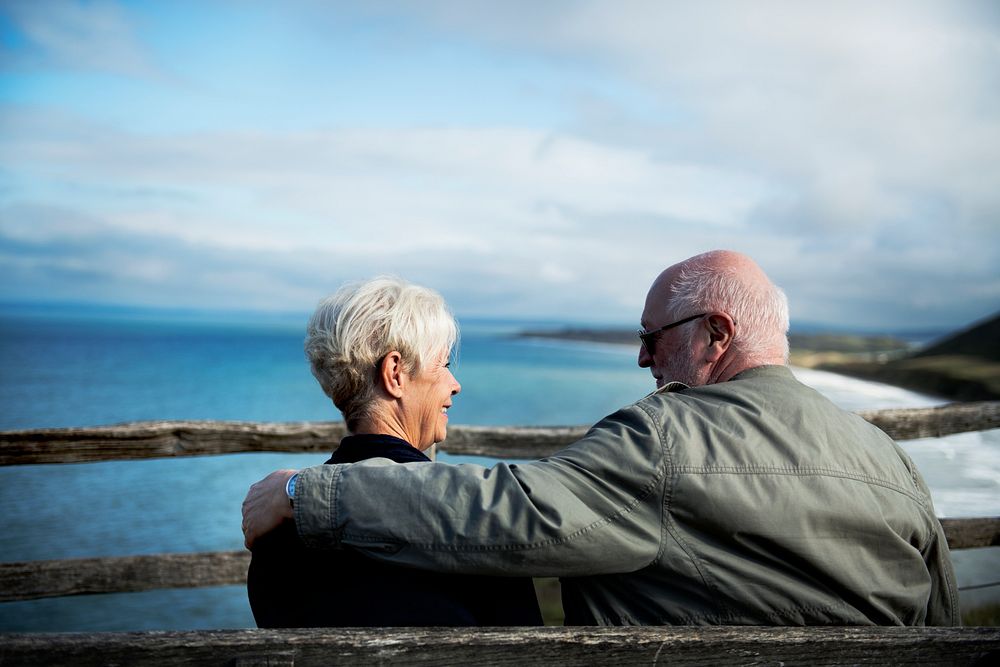 Senior couple enjoying the view of the ocean