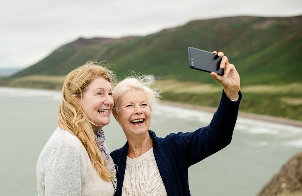 Senior women taking a selfie together