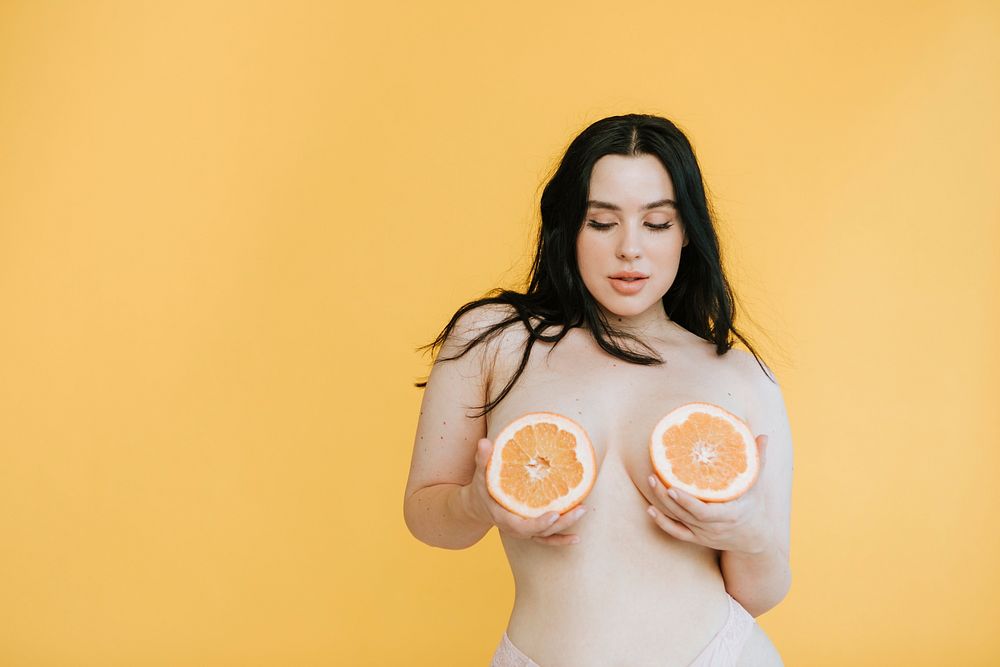 Beautiful woman with fruit boobs